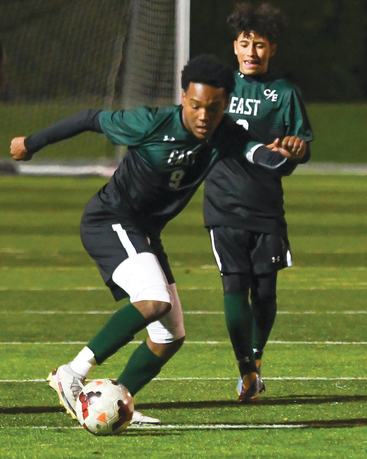 PLAYOFF BOUND: Christian Mestre works his way up the field against Toll Gate.